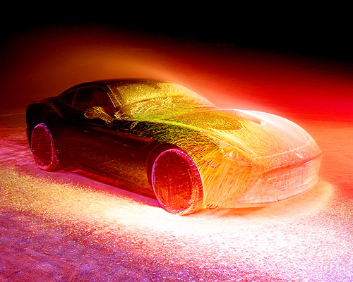 fabian oefner sprays ferrari california T with UV paint to envision speed