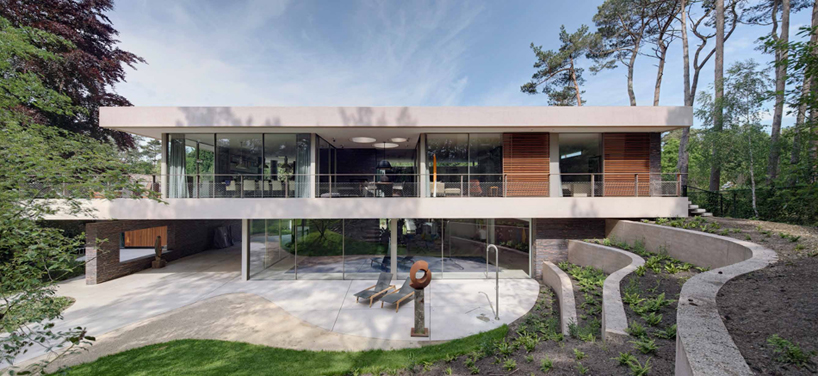 hilberink bosch architecten integrates dune house with the forest
