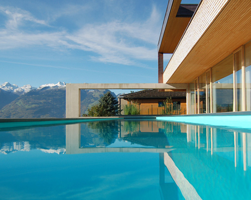 wohnhaus schaan by k_m architektur frames expansive rhine valley