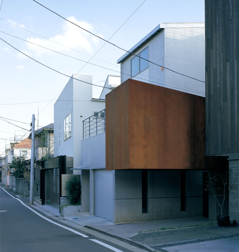 niizeki studio balances the KHB residence atop a concrete wall