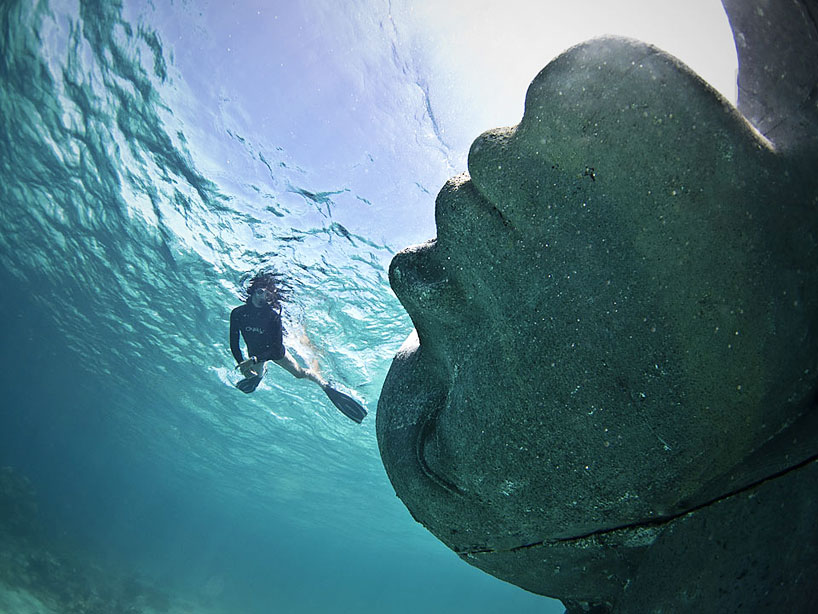 jason decaires taylor submerges ocean atlas sculpture in the bahamas