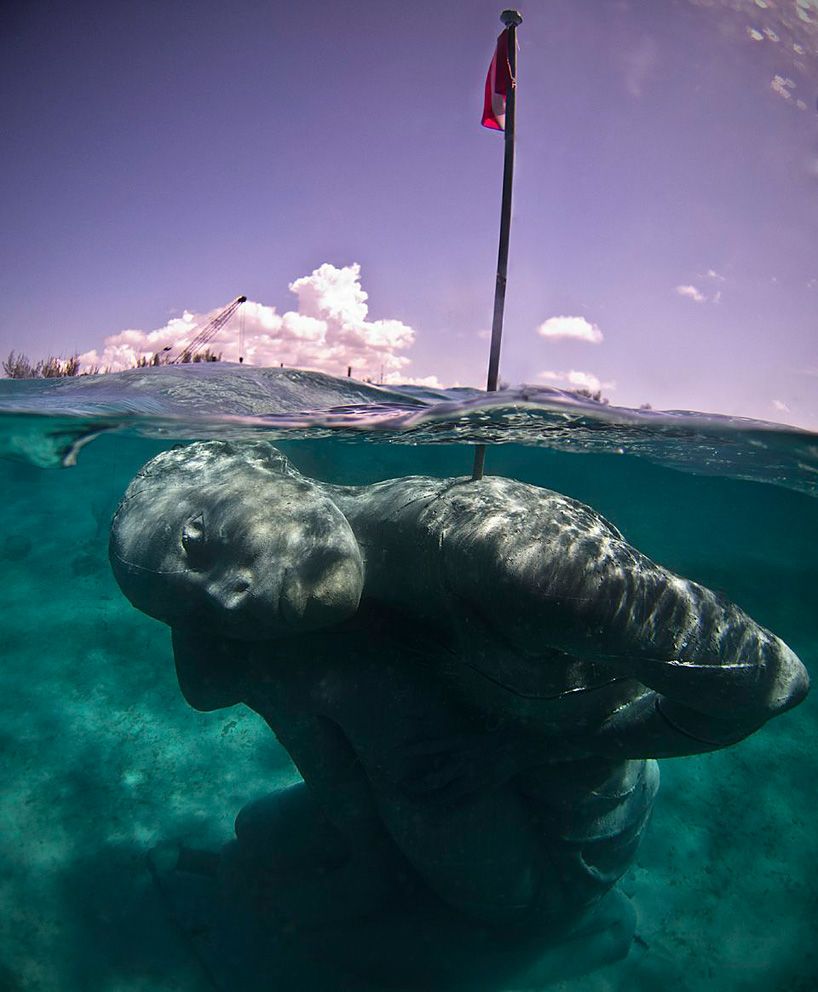 jason decaires taylor submerges ocean atlas sculpture in the bahamas
