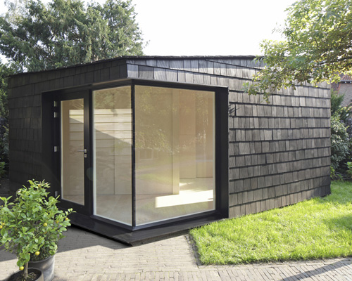 serge schoemaker covers garden studio with 2000 handpainted shingles