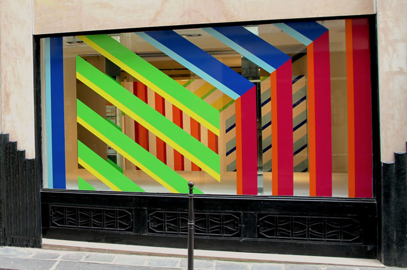Robert Storey Studio uses lurid colours to light Nike pop-up shop