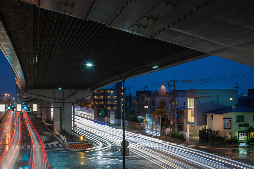 pilotis used to elevate TOFU architects' highway adjacent dwelling