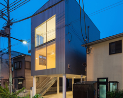 pilotis used to elevate TOFU architects' highway adjacent dwelling