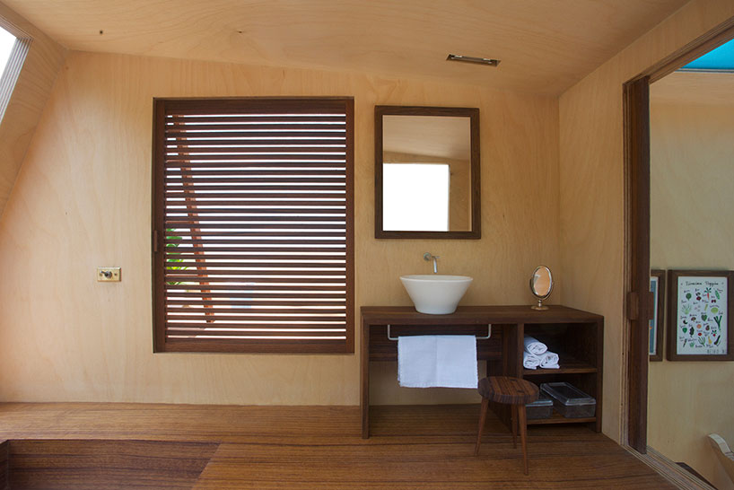 architecture brio scales down the spiral doll house at 1:6