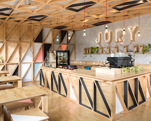 jury cafe by biasol design studio constructed from a mix of raw materials