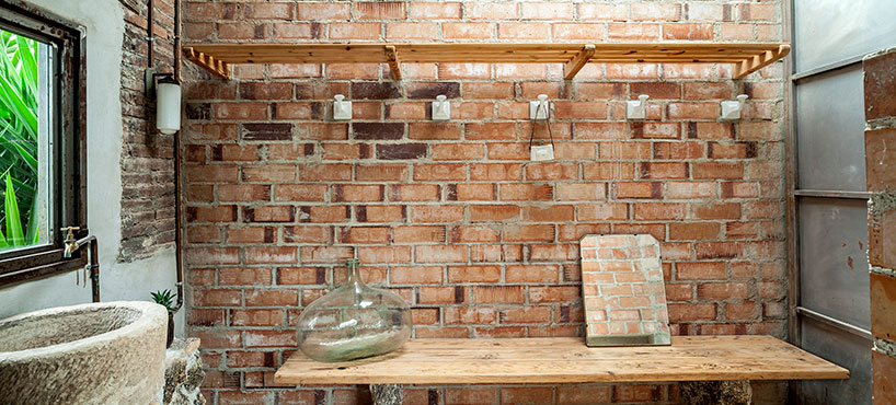 clara nubiola converts a deteriorating shed into the cube changing room