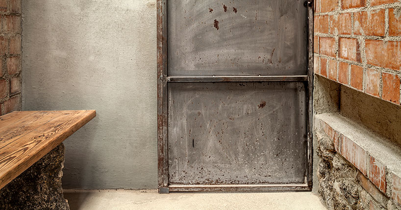 clara nubiola converts a deteriorating shed into the cube changing room