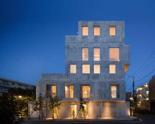 hiroyuki ito completes staggered concrete apartment building in tokyo