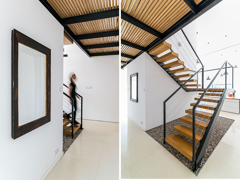 kropka studio projects a house in the landscape of stone and wood