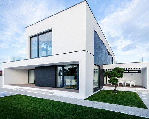 black and white C house by parasite studio in timisoara, romania