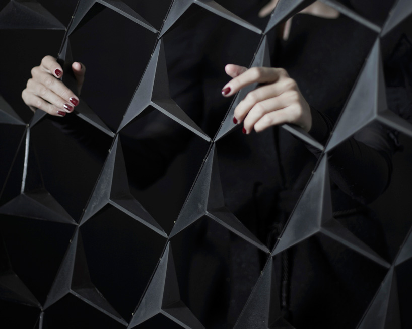 siba sahabi translates moorish architecture into triangulated wall divider