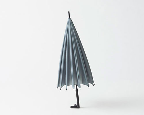 nendo-designed stay-brella for by | n stands + hangs on its own