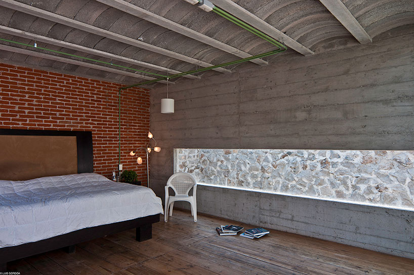 t3arc builds the concrete casa materka around a piano