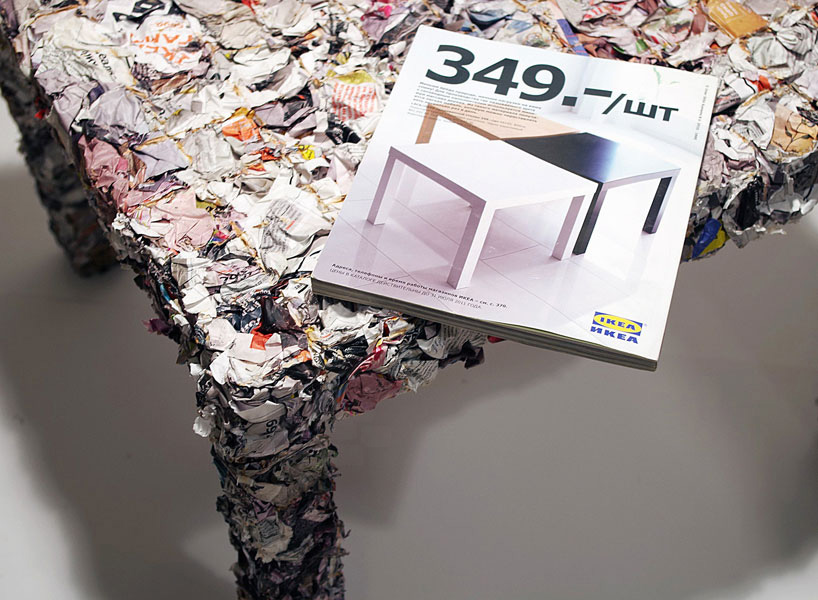 a table made from every single page of an IKEA catalogue