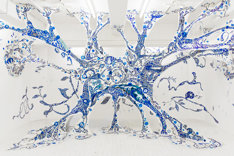 yusuke asai stretches hand painted web within tokyo gallery