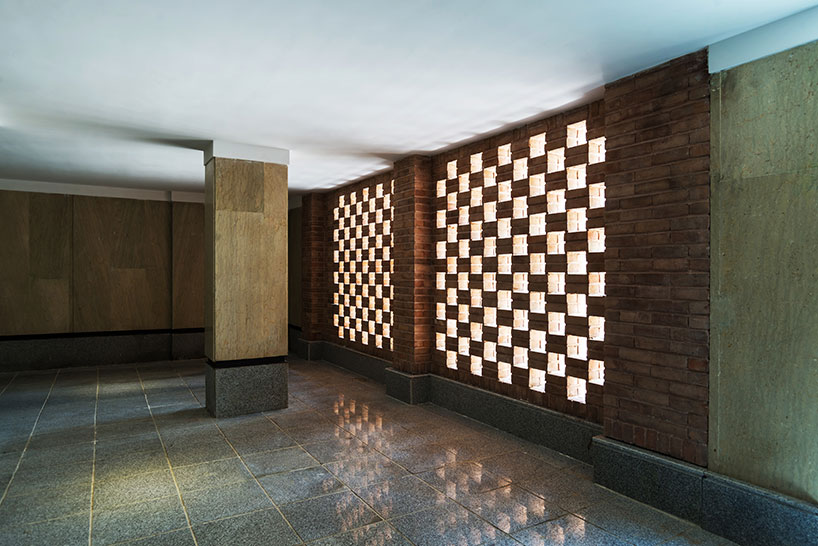 boozhgan architecture studio sculpts a dynamic brick facade for the haghighi house