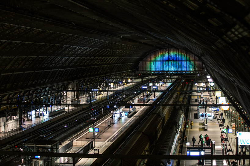 daan roosegaarde opens rainbow station at amsterdam central station