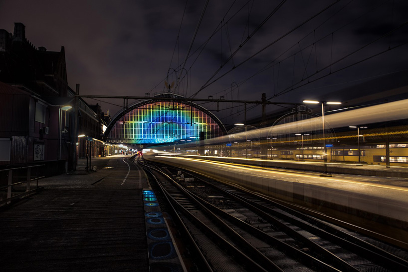 daan roosegaarde opens rainbow station at amsterdam central station