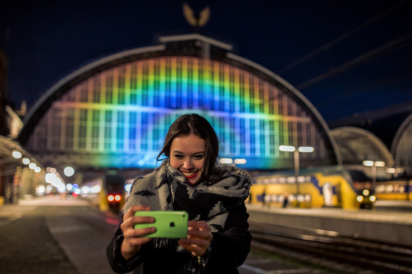 daan roosegaarde opens rainbow station at amsterdam central station