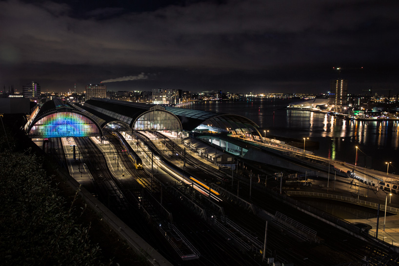 daan roosegaarde opens rainbow station at amsterdam central station