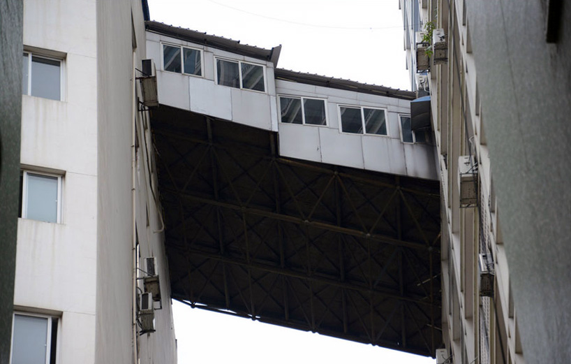 illegal corridor bridge highrise nanning china designboom