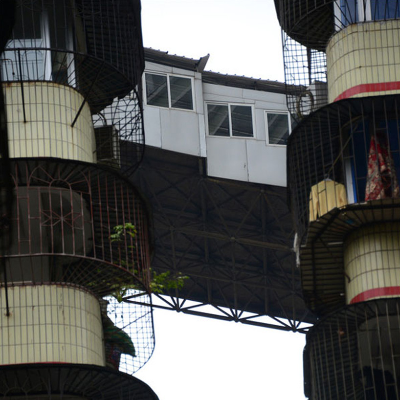 illegal corridor bridge highrise nanning china designboom