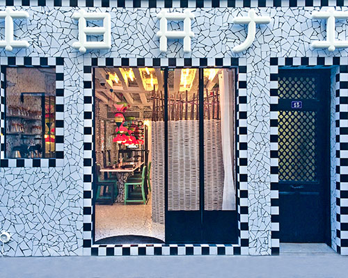 paola navone wraps ibaji restaurant in fragmented tiles 