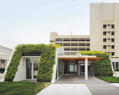 ronald lu & partners fold green roofs for SK yee healthy life center