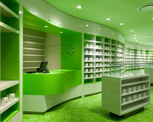 sergio mannino brands careland pharmacy with green furniture + graphics