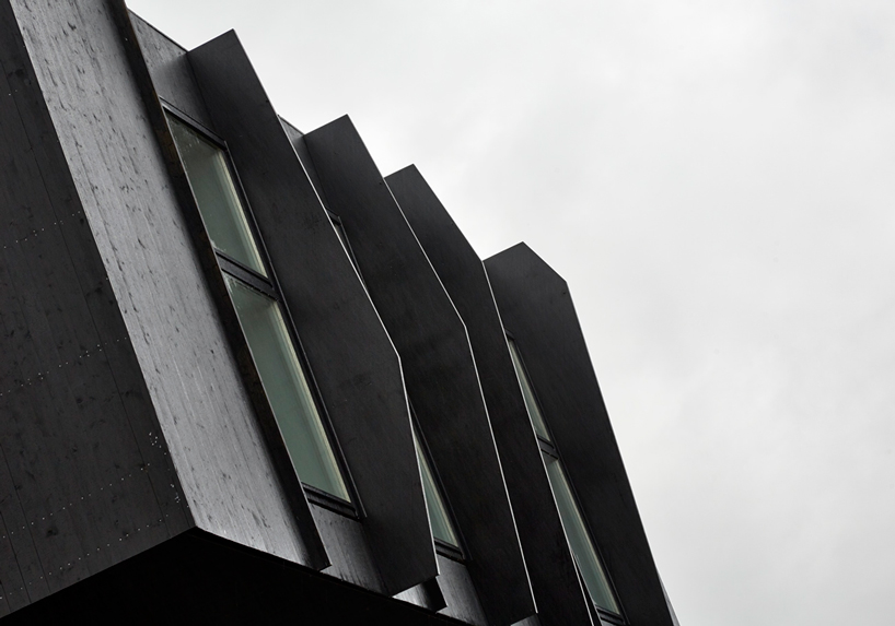 snøhetta's tilted zero energy house completed in norway