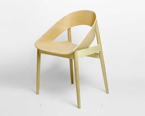 tatsuo kuroda produces minimalist ring chair from bent plywood + beech 