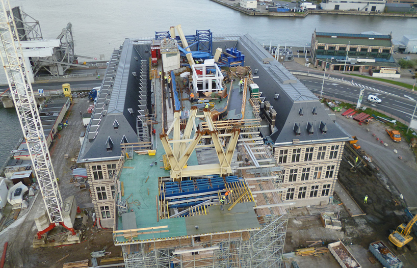 construction well underway at zaha hadid's port house in antwerp