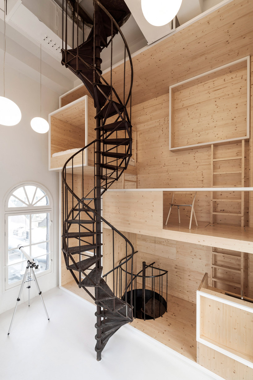 i29 stacks a series of timber volumes for artist in residence program