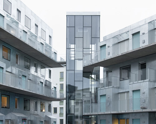 joliark constructs metallic apartment complex in stockholm, sweden