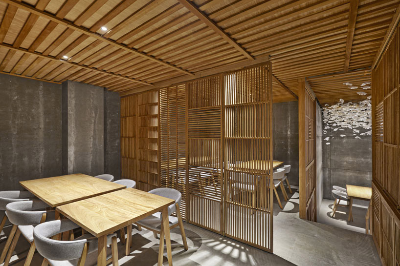 nozomi sushi bar by masquespacio designed as a japanese street