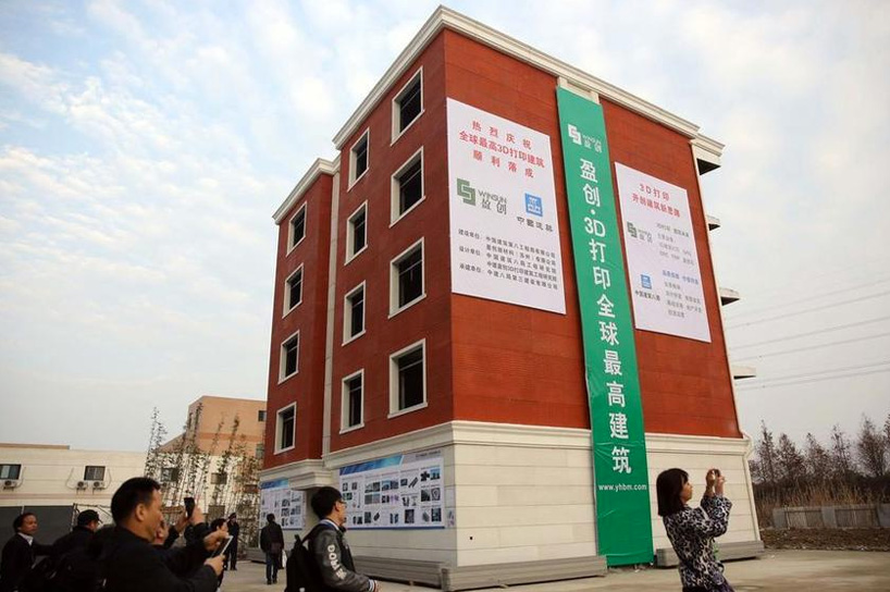 chinese-based winsun 3D prints six-story apartment & mansion buildings