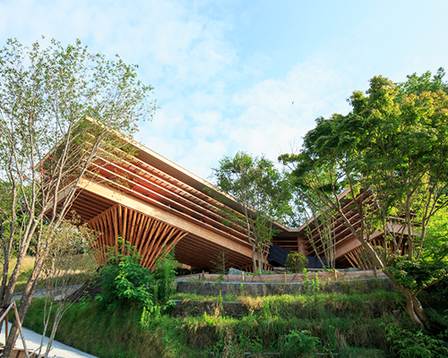 life style koubou embeds timber dwelling into japanese hillside