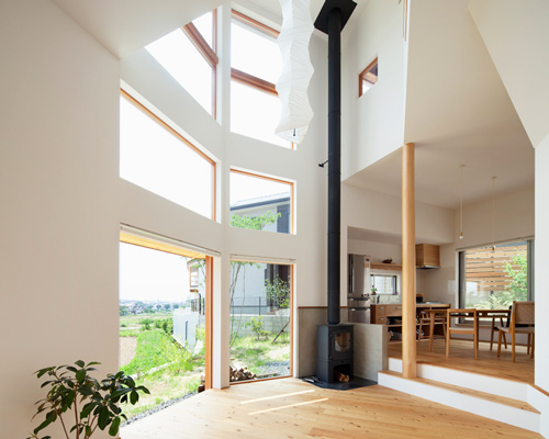 mamiya shinichi design studio angles the timber-clad frontier house