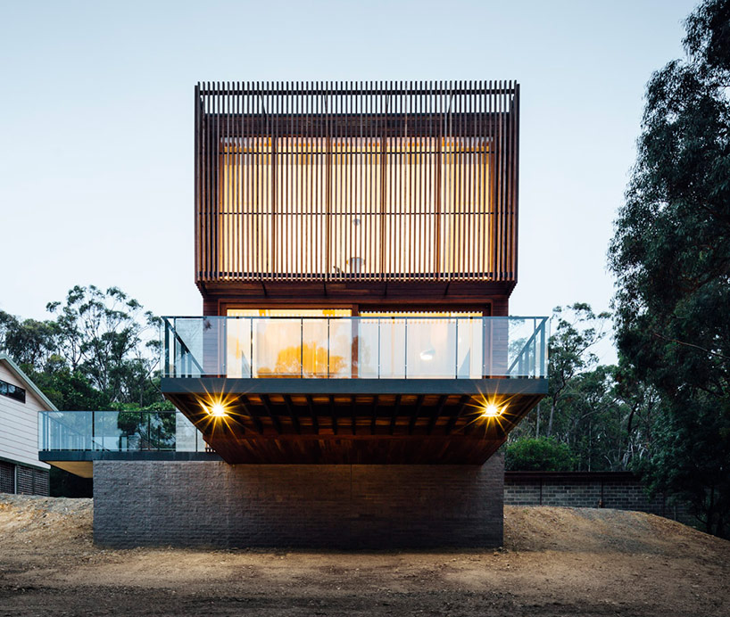 maloney architects constructs the invermay house of concrete, wood, and glass