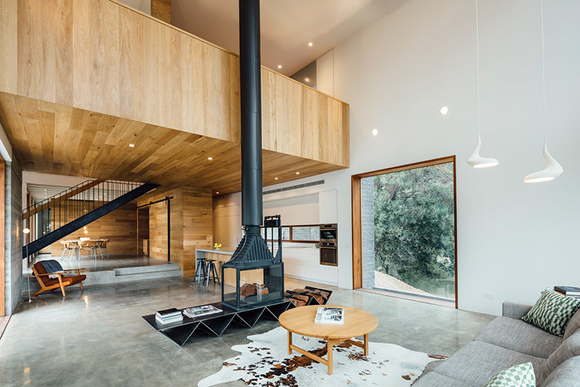 maloney architects constructs the invermay house of concrete, wood, and glass