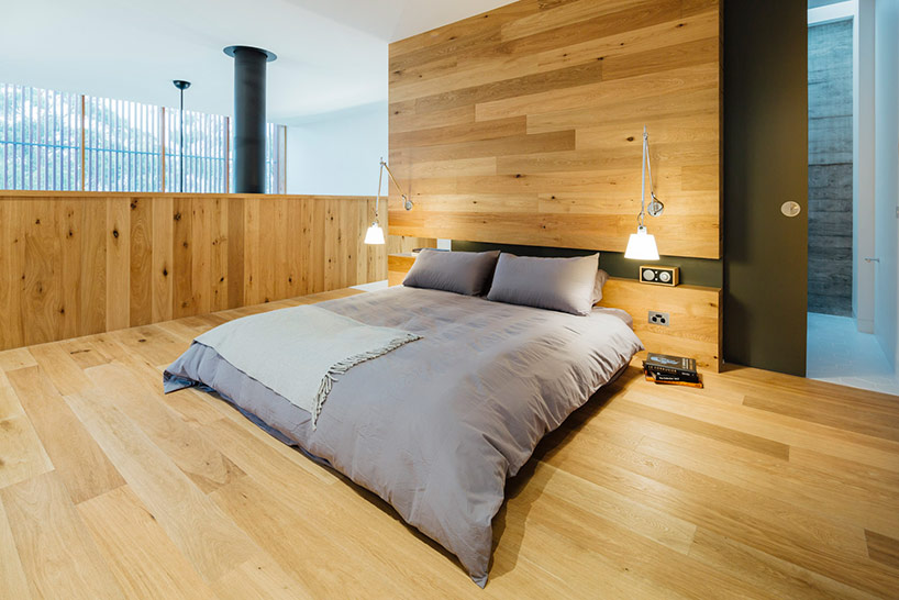 maloney architects constructs the invermay house of concrete, wood, and glass