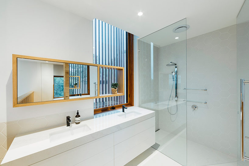 maloney architects constructs the invermay house of concrete, wood, and glass