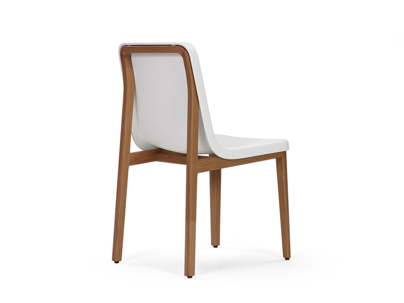 neri&hu's sedan chair for classicon visually wraps seat shell over frame