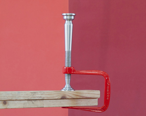 clamp-styled pamoto candleholder by designers dor tal and ofer berman