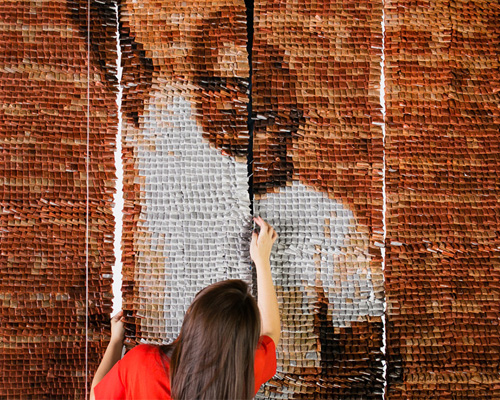red hong yi composes portrait of teh tarik man with 20,000 teabags