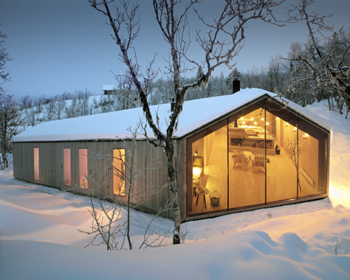 reiulf ramstad's V-lodge serves as a timber retreat in norway