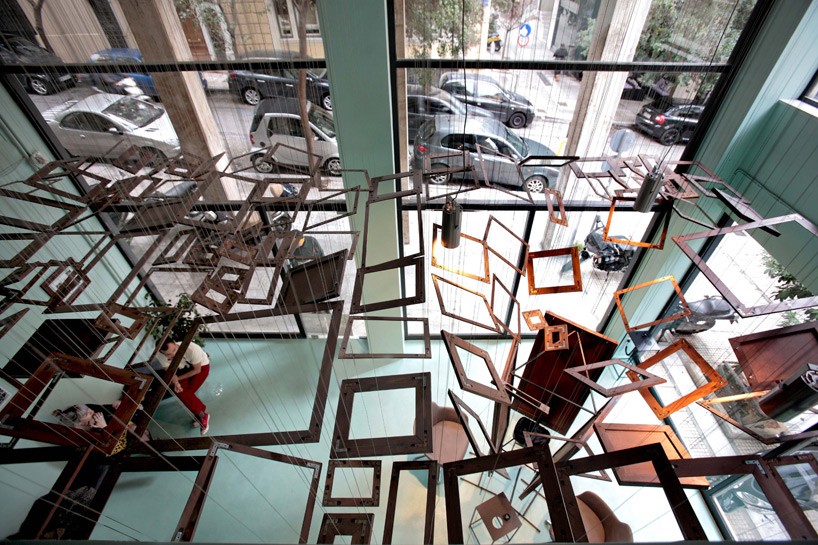 cascading frames greet customers at talkin' heads hair salon in athens